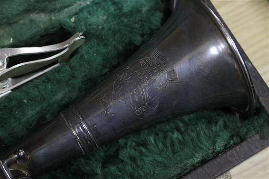 A Gladiator silver plated clarinet, cased